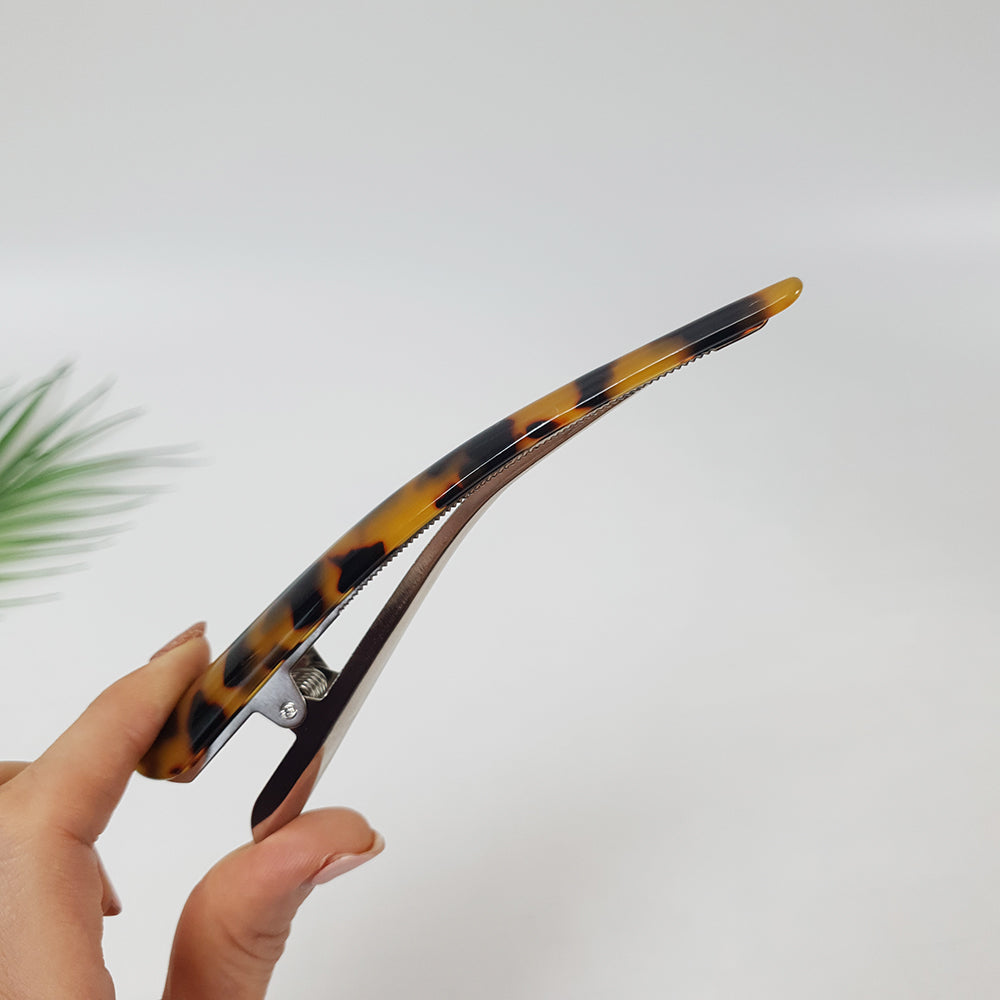 Long alligator hair clip opened to show the hinge