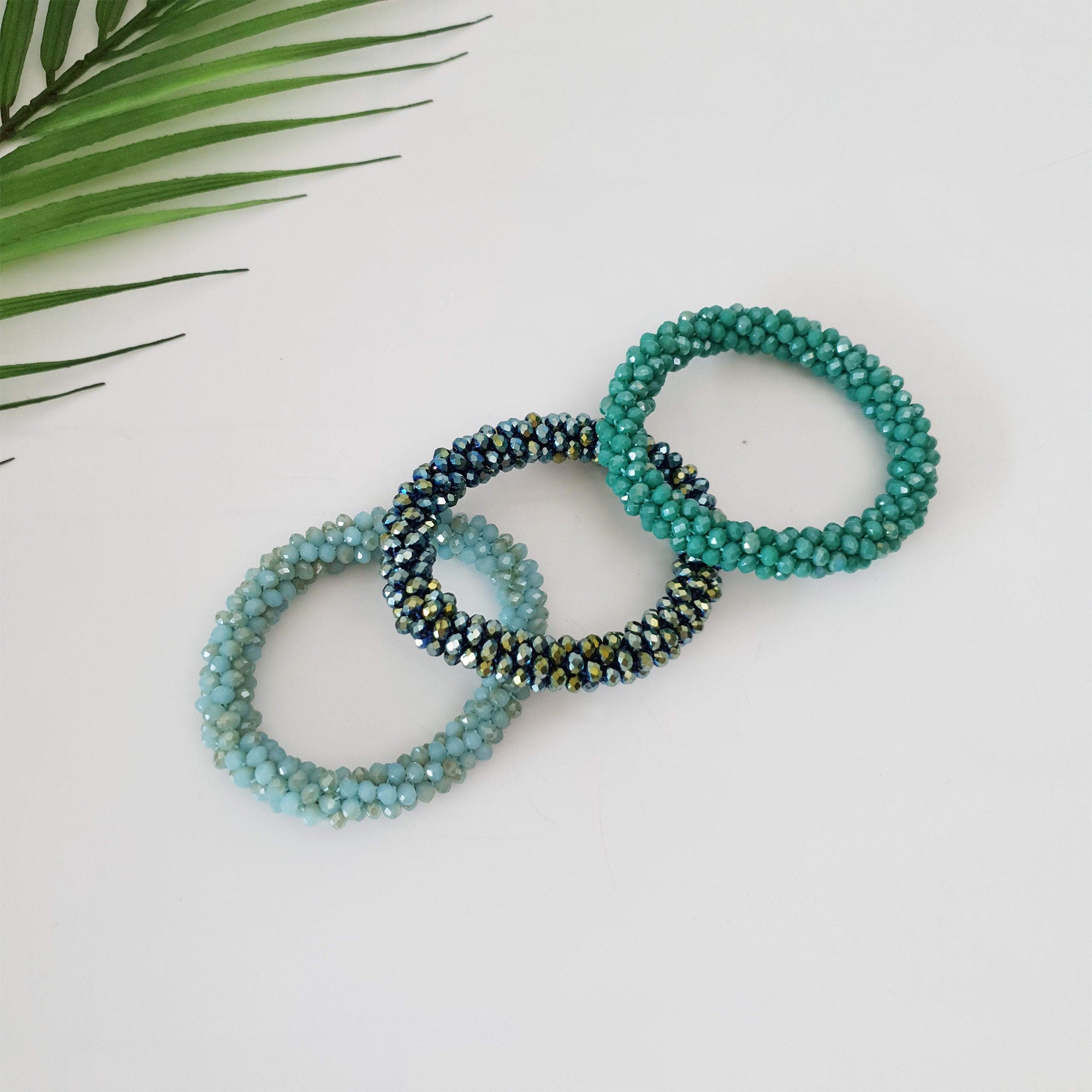 Sparkling glass bead hair tie bracelet in silver blue and brown. 2.5 inch elastic ponytail holder. Cute boho Korean fashion accessory for women birthday gift.