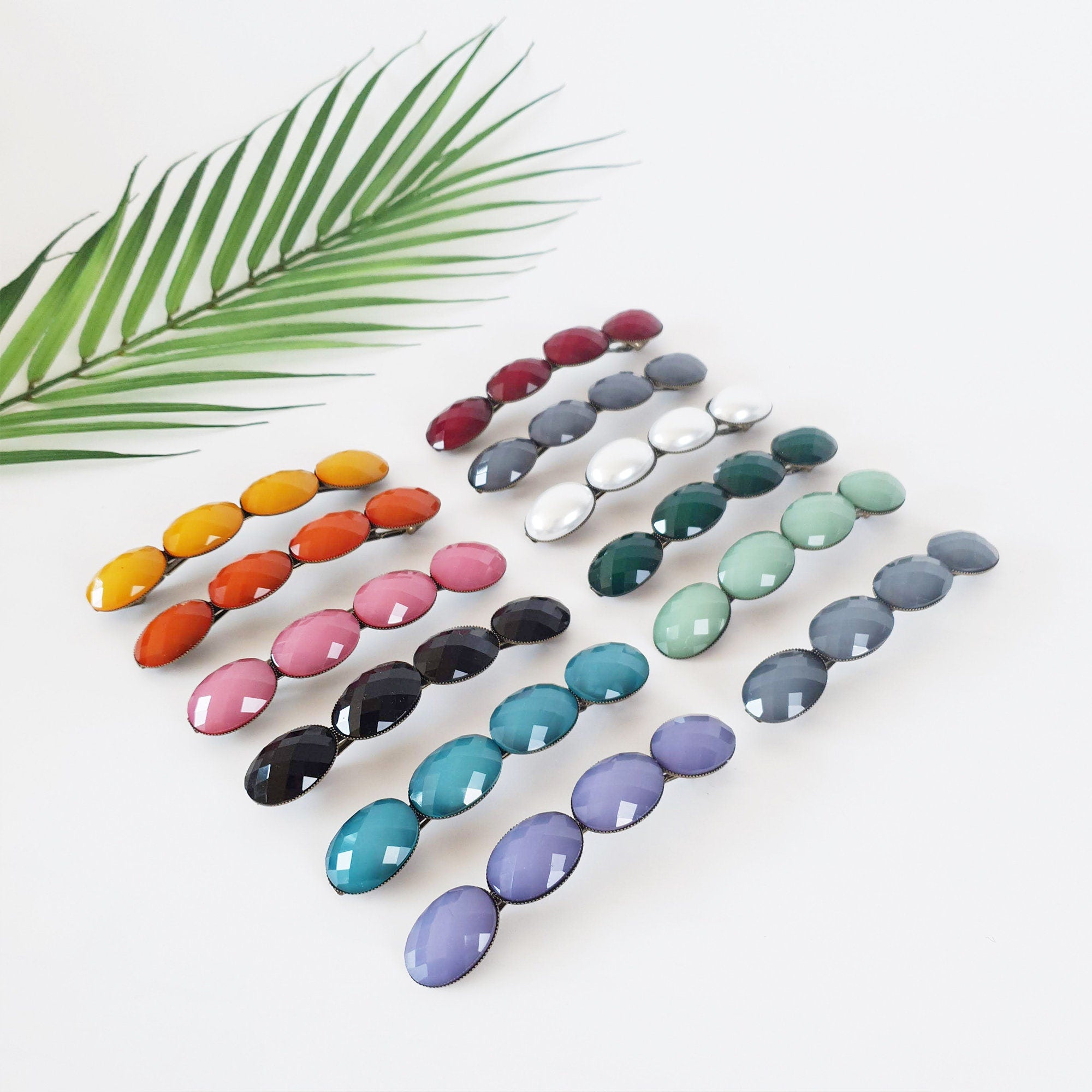 Long vintage style antique brass French barrette featuring large oval acetate stones. 4.1 inch retro hair clip for thick hair and ponytail holder.