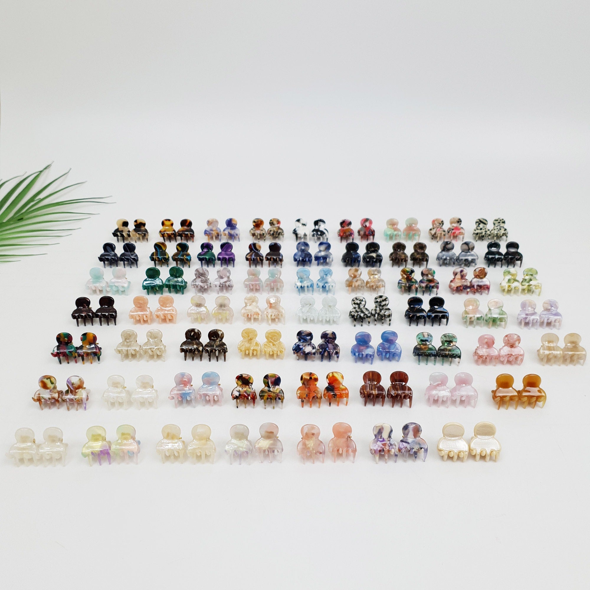 Cellulose acetate small hair claws in tortoise shell and marble patterns, minimalist mini jaw clips set for women and toddlers, sturdy french barrette design.