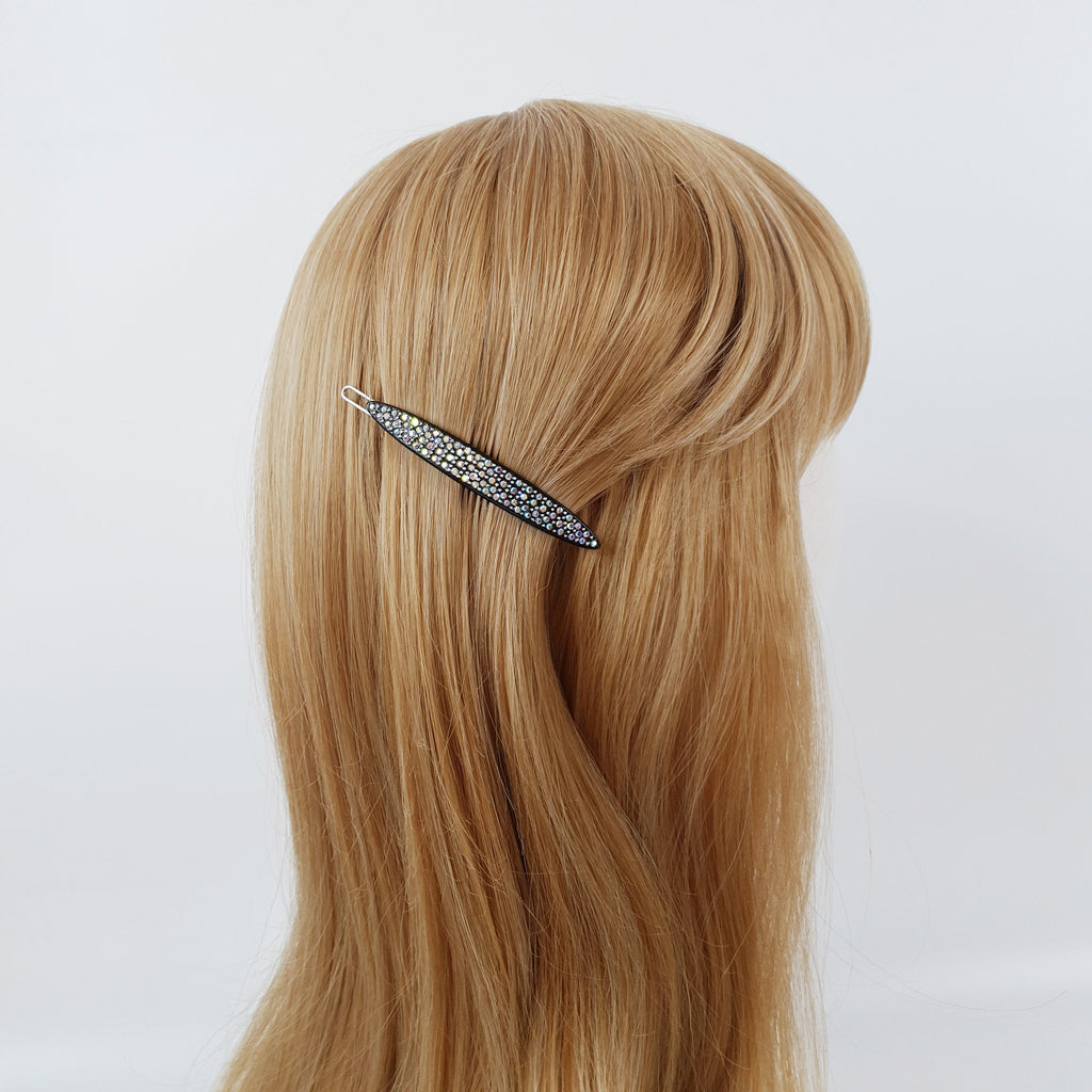Slender cellulose acetate snap clip embellished with sparkling rhinestone crystals. Long oval barrette for holding bangs or side hair.