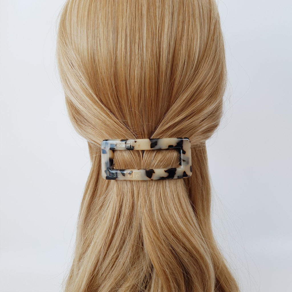 Cellulose acetate rectangular buckle hair barrette in tortoise shell and marble patterns. Medium size automatic clip for half up hairstyles.