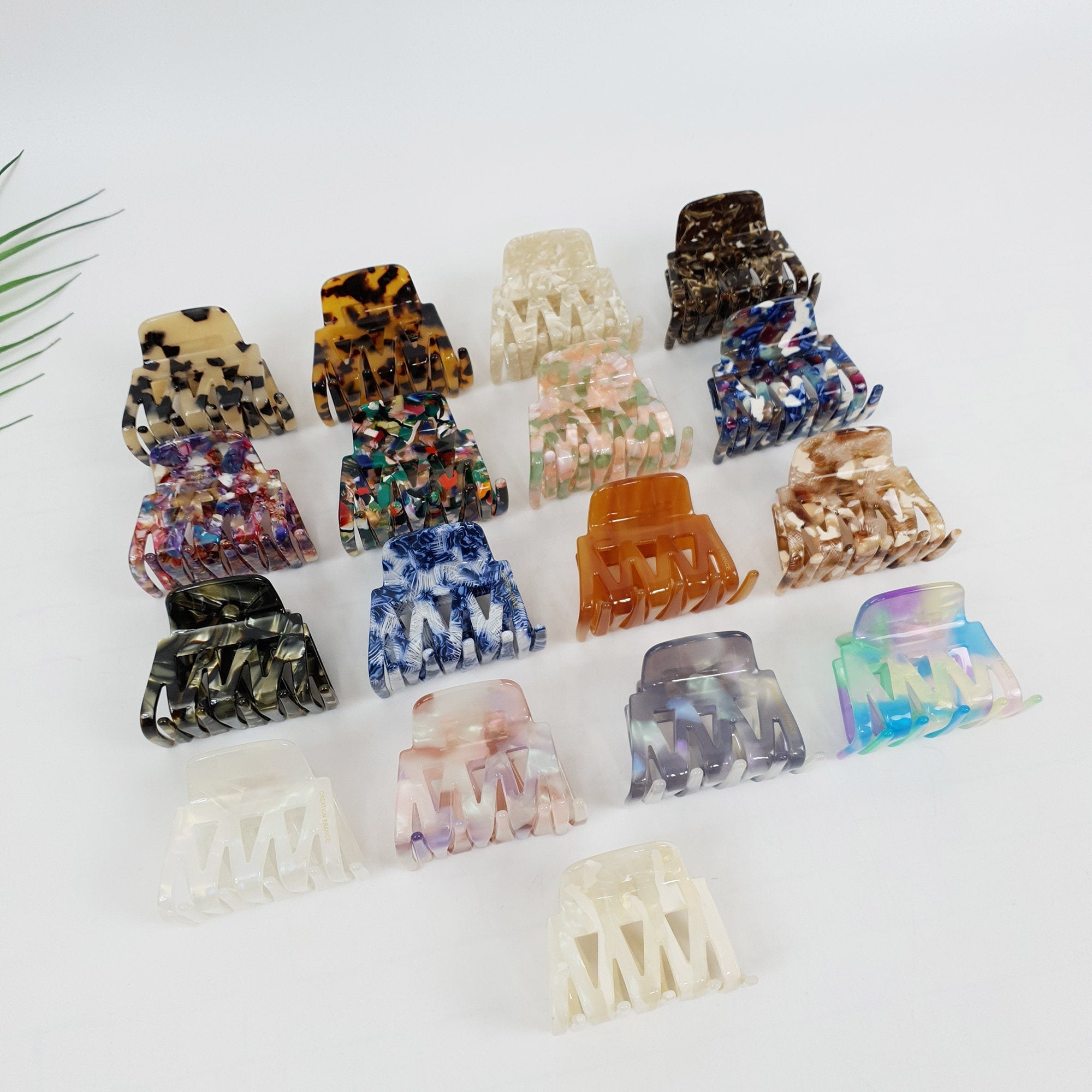Small cellulose acetate hair claw clip in tortoise shell and marble patterns for half up hairstyles. Mini square jaw clip for women.