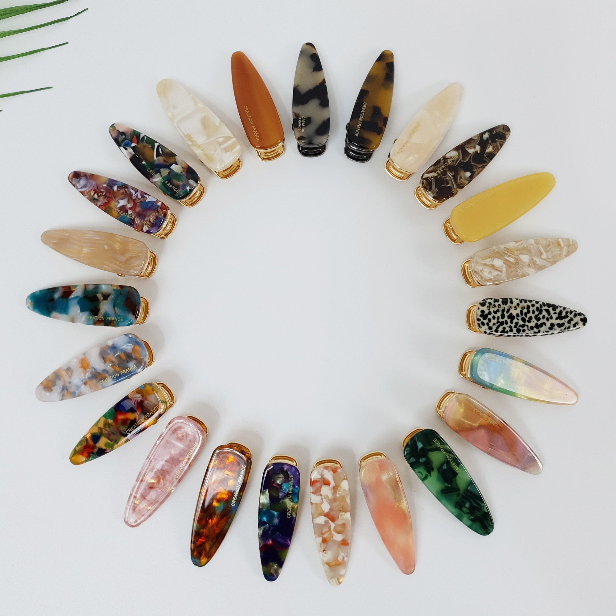 Triangular cellulose acetate hair clip in tortoise shell and pastel colors, 2 inch geometric alligator clamp for side bangs, cute minimalist styling tool for fine hair.