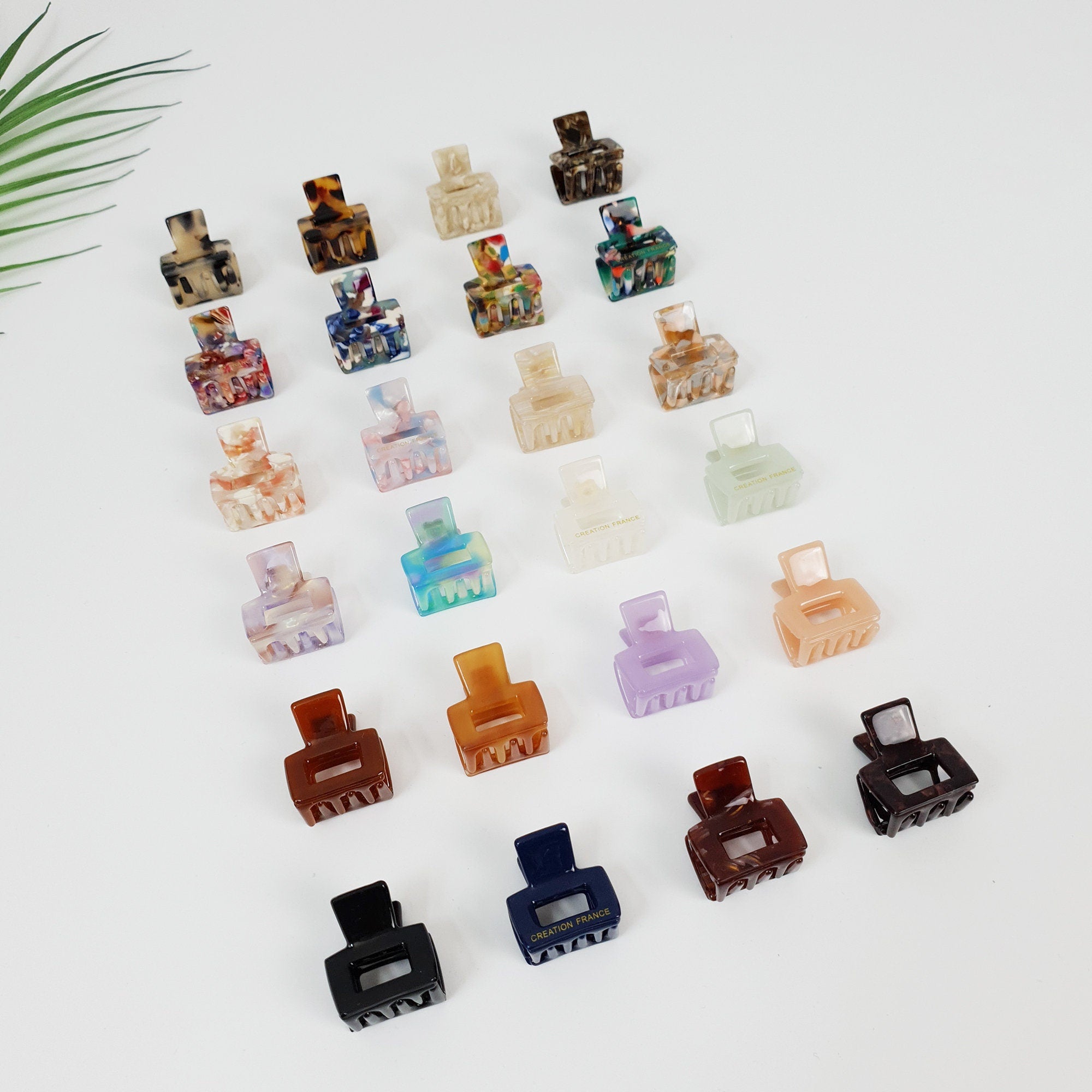 Tiny rectangular cellulose acetate hair claw clips in tortoise shell and marble colors. Micro 0.8 inch clips for styling bangs, side hair, or toddlers.