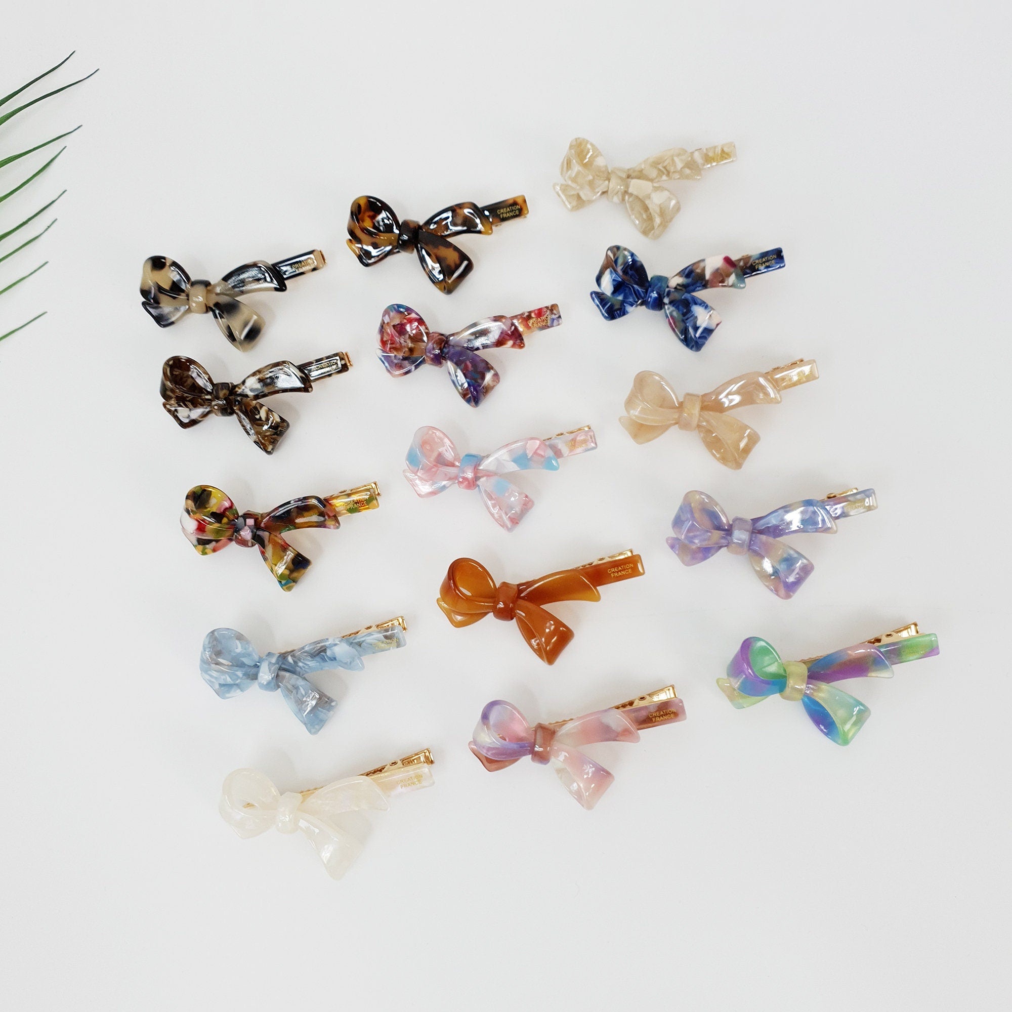 Cellulose acetate double bow hair clip in tortoise shell and marble patterns, small alligator clip for side bangs, cute hair accessories for women and girls.