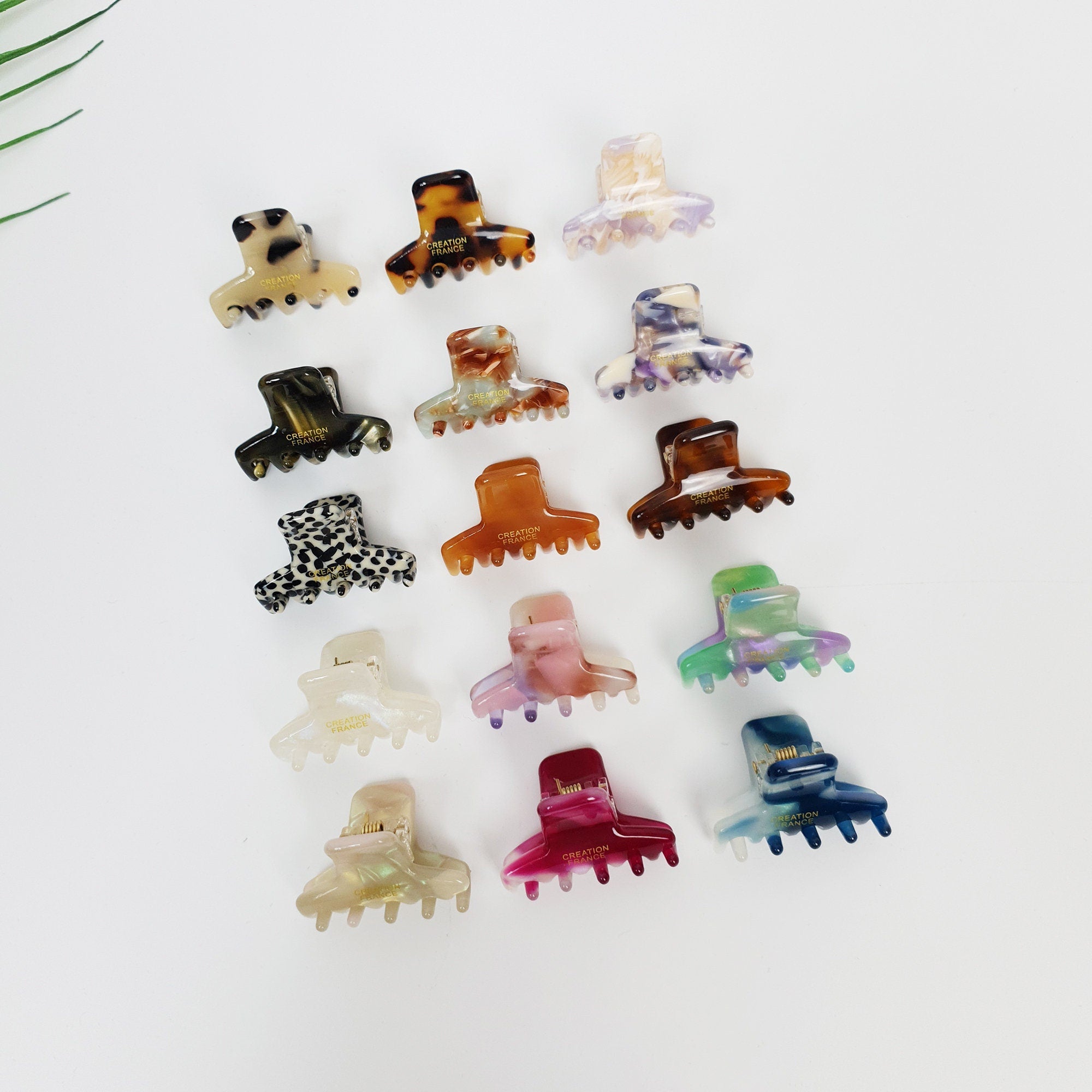 Cellulose acetate mini hair claw clip in cap shape. 1.2 inch small tortoise shell jaw clamp for bangs and side hair styling.