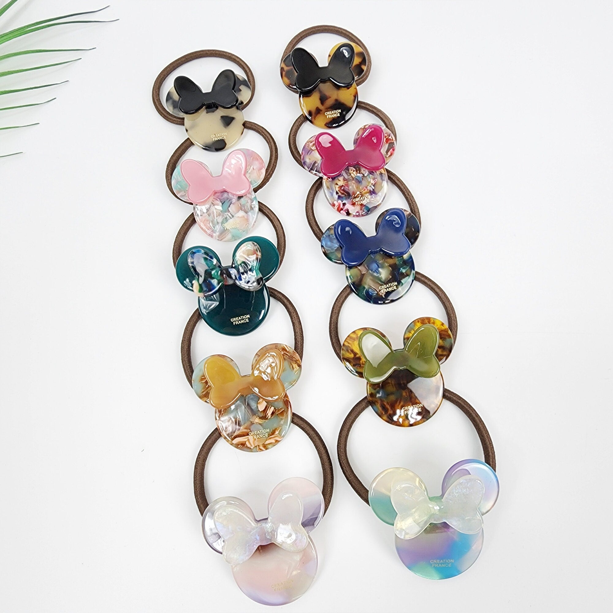 Glossy cellulose acetate mouse hair tie with bow in tortoise shell and pastel colors. 1.7 inch cute cartoon animal ponytail holder for girls and women. Preppy Korean fashion accessory birthday gift.