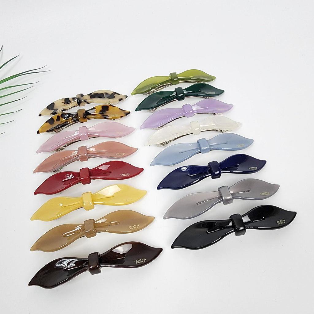 Small cellulose acetate bow barrette for side hair styling. Tortoise shell and solid color french clip. 3.7 inch automatic hair pin for half updos and bangs.