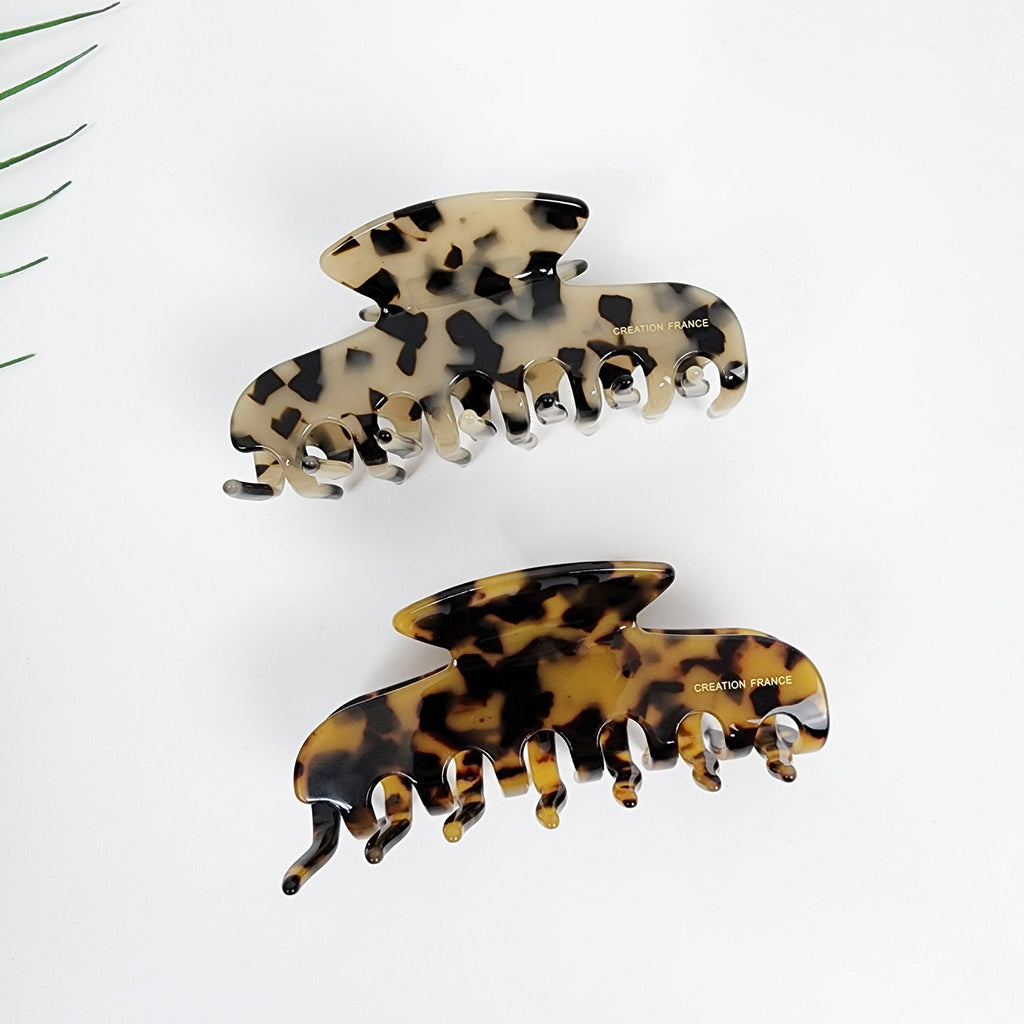 Cellulose acetate hair claw clip in tortoise shell pattern. 3.9 inch jaw clip for thick hair updo or half up style. Brown leopard print accessory for women.