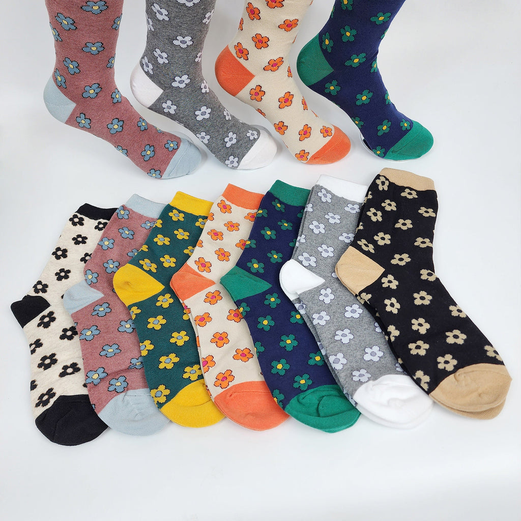 Brighten your daily steps with our Charming Daisy Pattern Crew Socks. Featuring a delicate floral motif scattered across a soft cotton blend, these socks offer the perfect mix of sweetness and comfort for all-day wear. The sturdy yet gentle band ensures they stay in place without slipping, making them an ideal choice for casual outings or adding a botanical touch to your work attire.