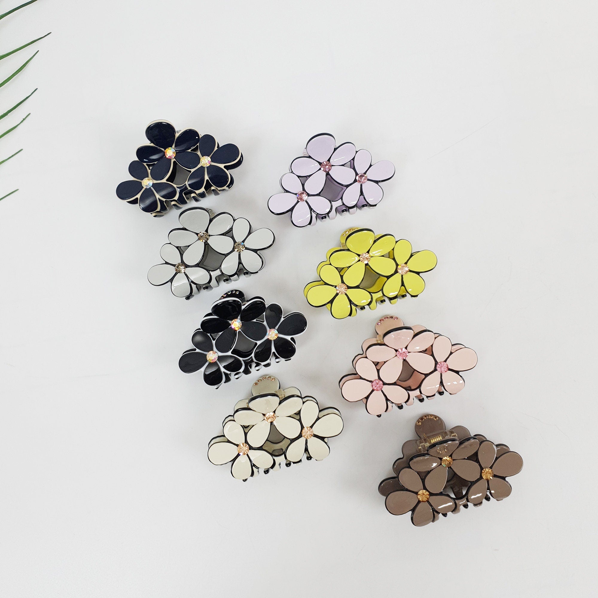 Small cellulose acetate hair claw clip with three pastel flowers. 2.4 inch floral jaw clip with rhinestone centers for half up hairstyles. Cute Korean hair accessories for women.