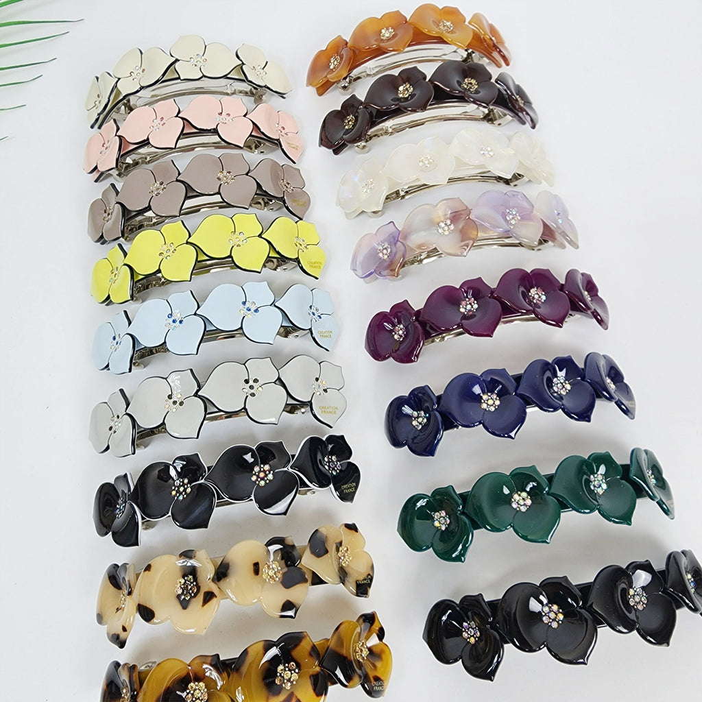 Cellulose acetate floral barrette with rhinestone centers. 4 inch automatic hair clip for ponytails and half updos. Pastel and tortoise shell flower hair accessory.