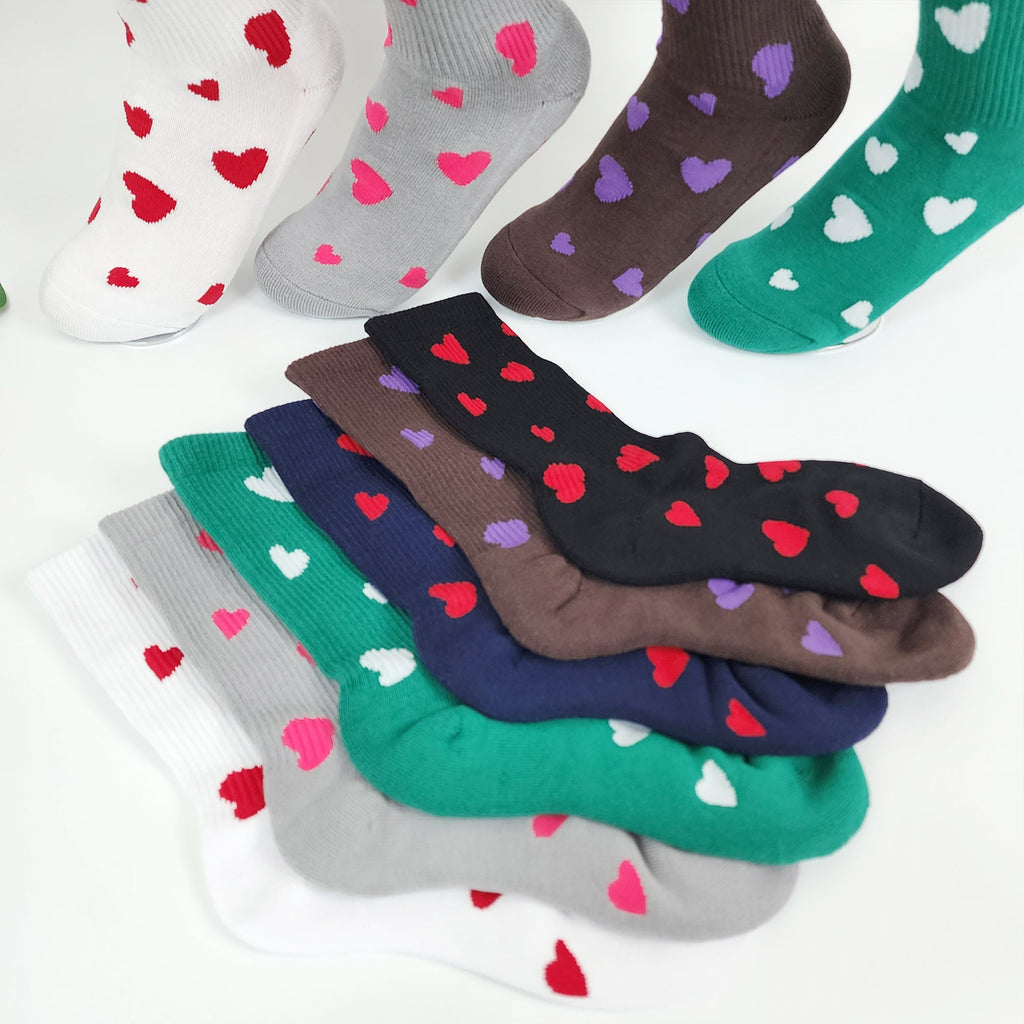 ✨ Lovely Heart Pattern Cushioned Socks
Add a touch of love to your workout or cozy days with these charming crew socks. Featuring a plush terry cushioned sole ("towel bottom"), they provide extra shock absorption and warmth, making them perfect for hiking, running, or layering over leggings. With their high-quality yarn and non-slip fit, they offer the perfect blend of athletic function and cute Korean style for the colder seasons.