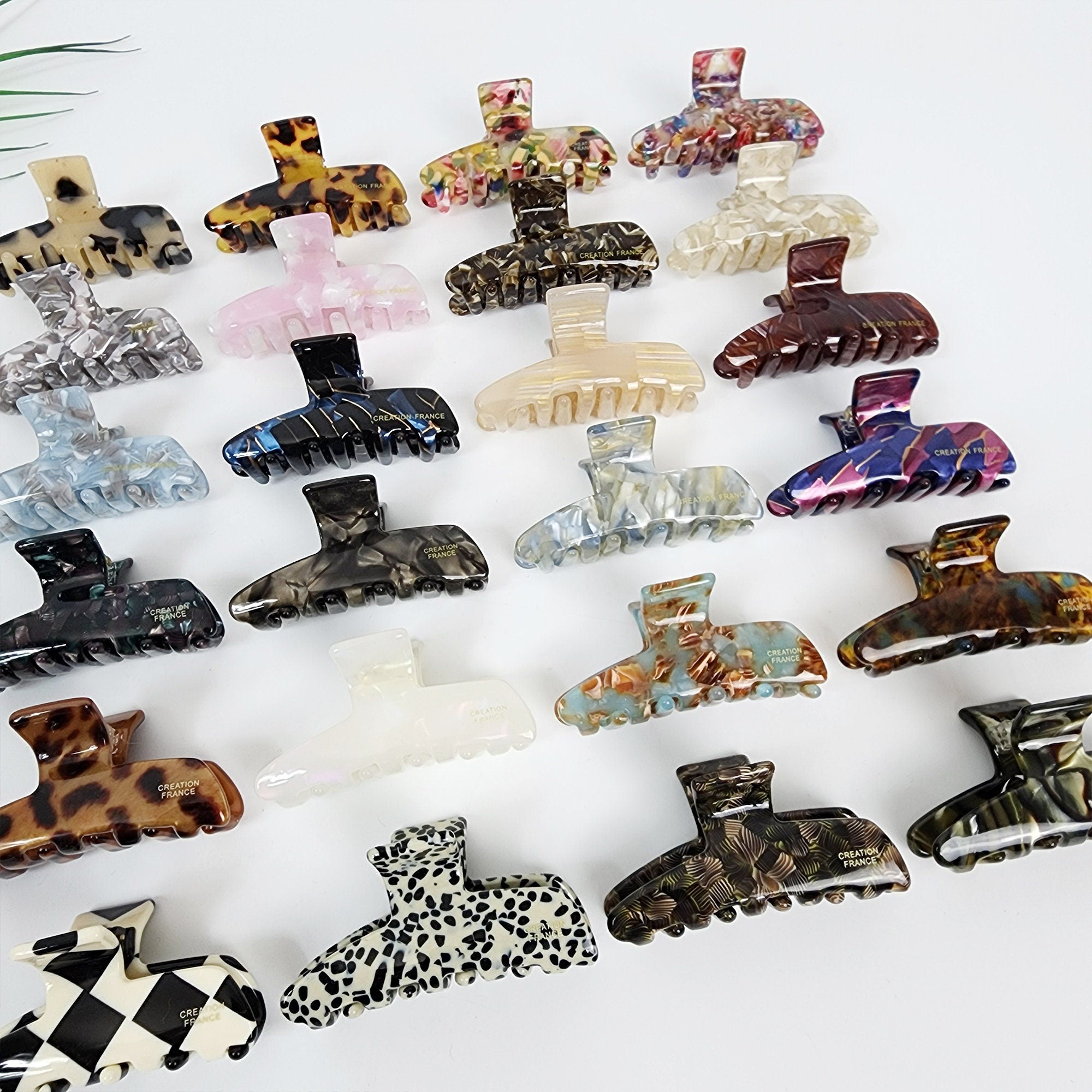Cellulose acetate small curved hair claw clips in 24 patterns. 2.4 inch sleek tortoise, checkerboard, and marble jaw clips. Korean hair accessories for thin hair.