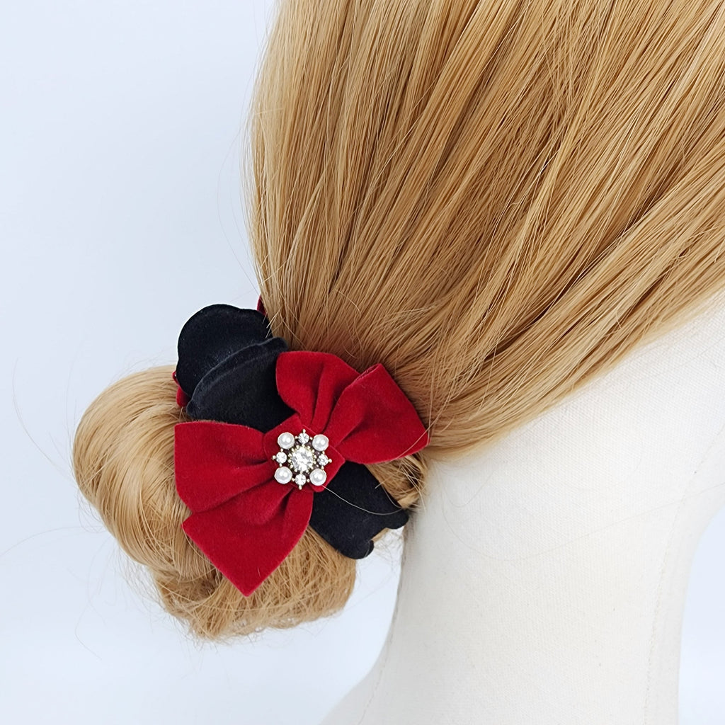 Velvet ribbon bun claw clip in black and red, round ponytail holder with pearl center option for Christmas and winter low bun styling. A black and red hair scrunchie with a rhinestone embellishment