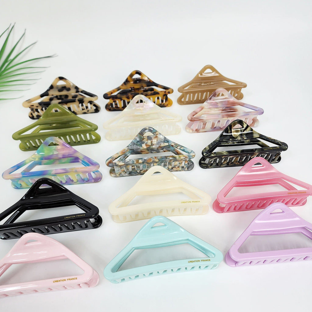 Cellulose acetate triangle hair claw clip in tortoise shell and pastel colors for women updo hairstyle