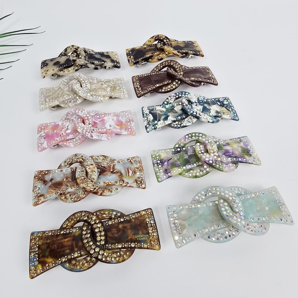 Cellulose acetate linked chain barrette with rhinestones. 3 inch sparkly crystal hair clip for half-up hairstyles and weddings.