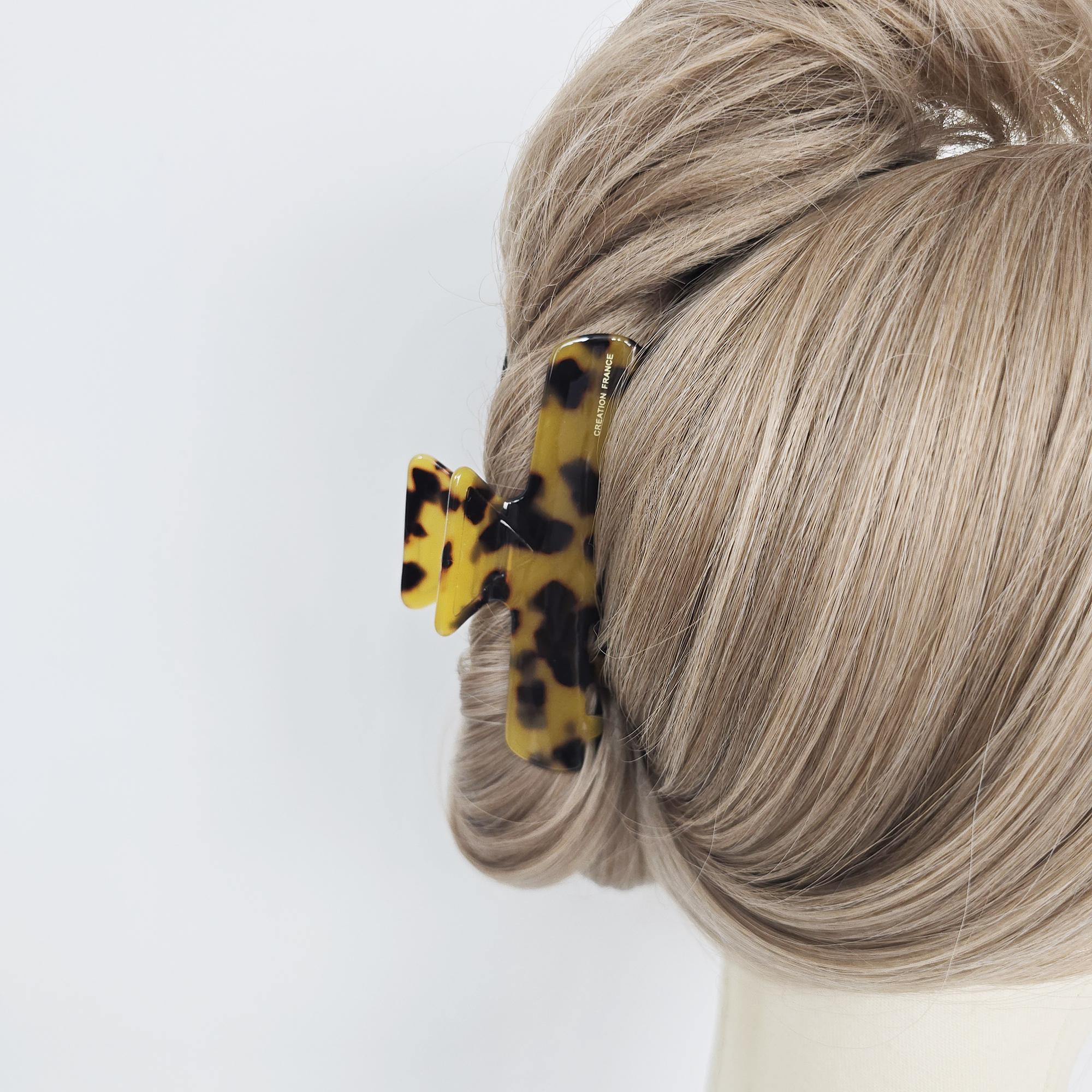 Cellulose acetate rectangular hair claw clips in tortoise shell and vibrant colors for modern french twist hairstyles.